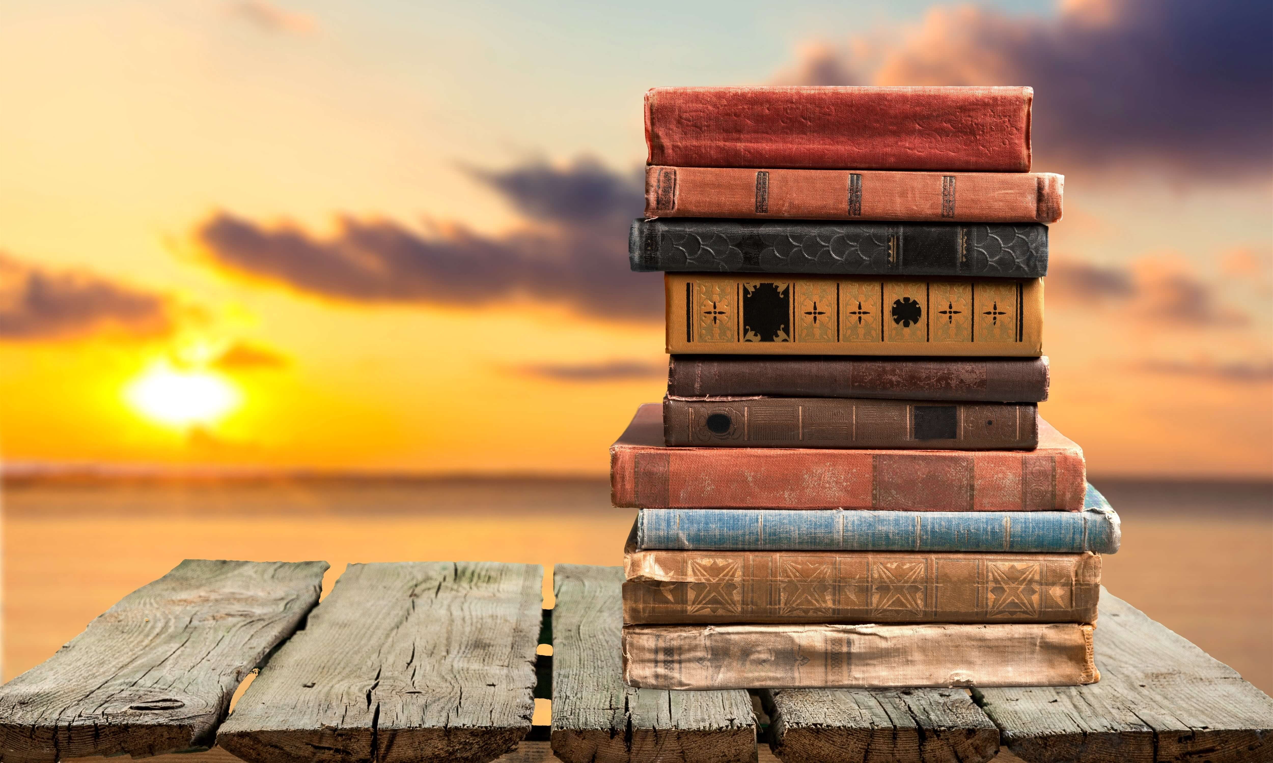 books, sunset, & travel