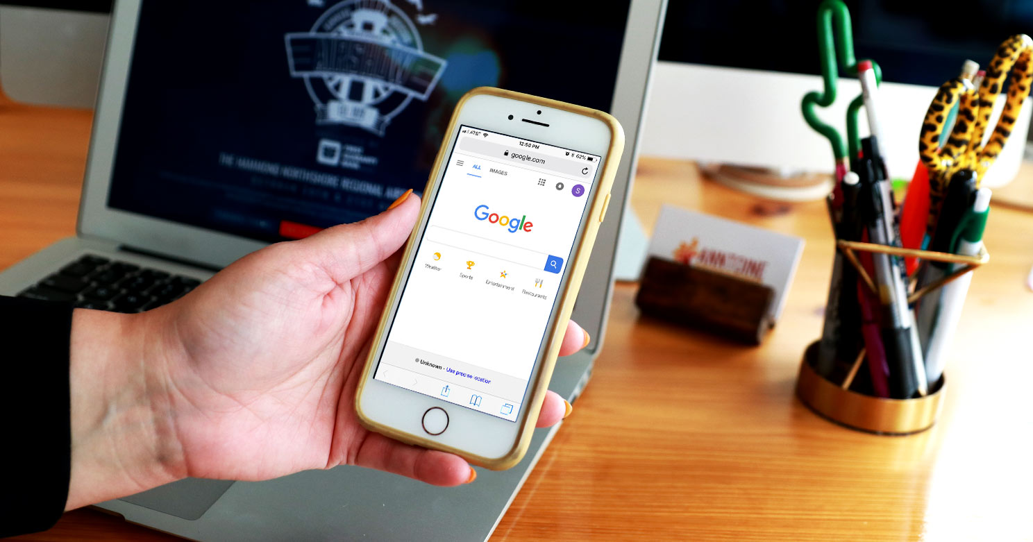 A person using Google Search on a mobile phone
