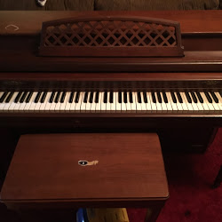 A piano ready for care after a move into a new room