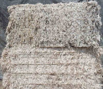 Groundwood Flyleaf Shavings w/ Hot Melt Glue