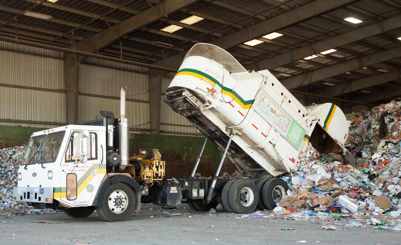Allan Company Truck Emptying Recyclables