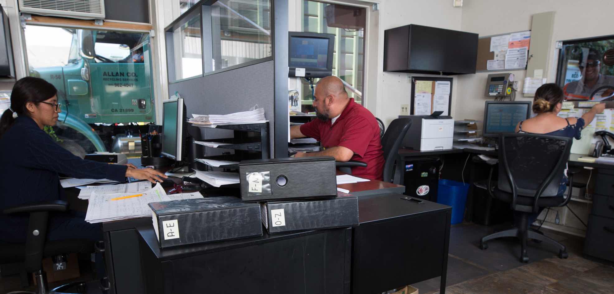 Photo of Allan Company Workers in the Office