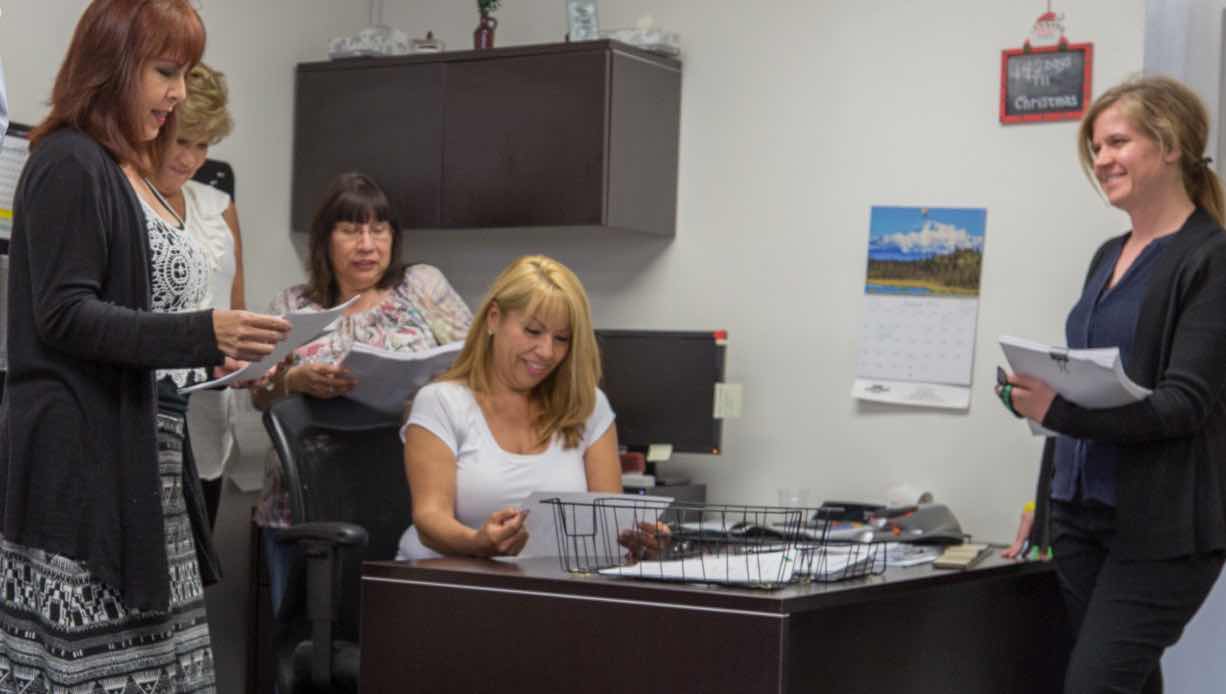 Photo of Allan Company Workers in the Office