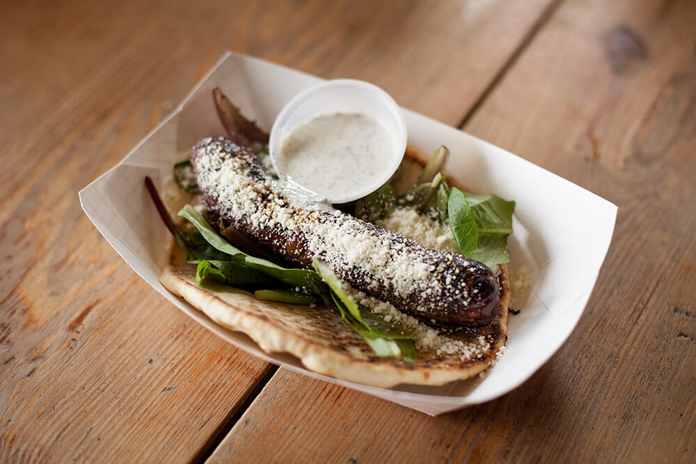 Housemade sausage, imported beer, the world-famous duck fat fries and an expansive biergarten that rivals any in the area makes Fassler Hall a very special place. (Photo: Valerie Grant)