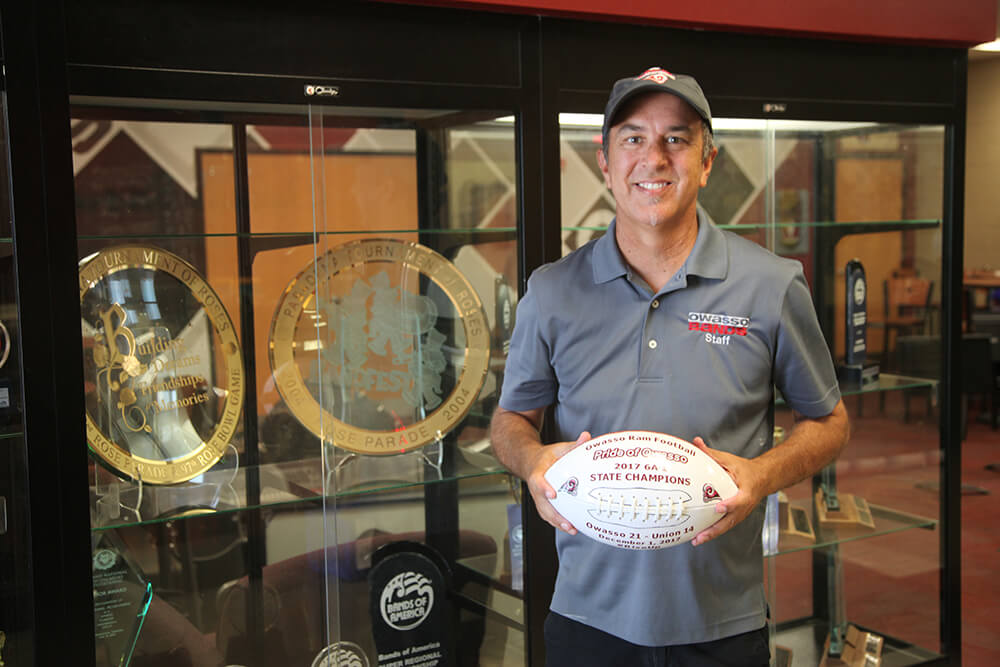Chris Harris, the director of the Pride of Owasso, his staff and his band students spend hours every day training. And it’s not just musical rehearsals. (Photo: Marc Rains)