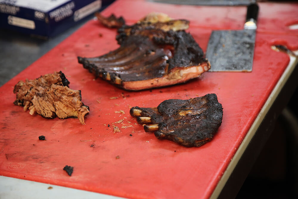 Elmer’s baby back ribs are fall-off-the-bone tender, full of smoky goodness and so tasty and juicy you don’t have to drown them in sauce. (Photo: Marc Rains)
