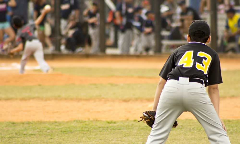 Child playing baseball