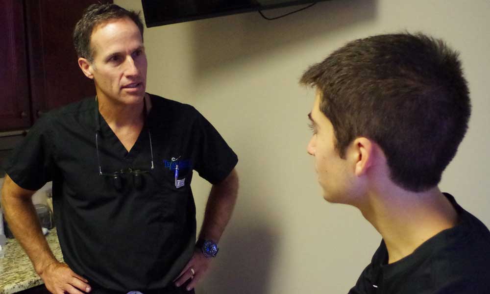 Doctor thompson talking to patient