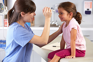 Nurse providing compassionate care to child patient