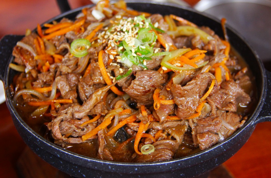 korean bbq cooking on a grill