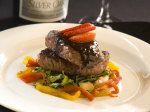 Grilled wapiti elk with celery root puree, zinfandel strawberry sauce, arugula & roasted pepper salad
