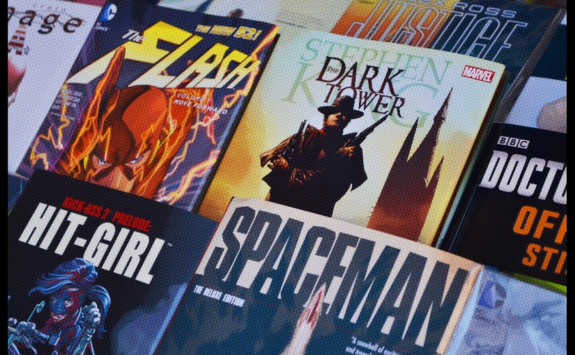 comic books in a comic book stand