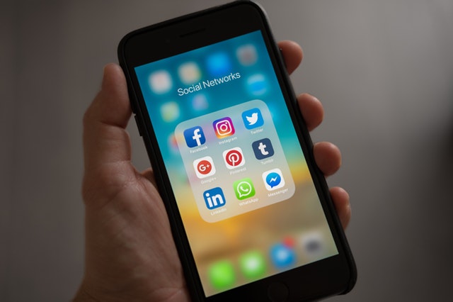 A cell phone screen displaying the logos for several social media apps.