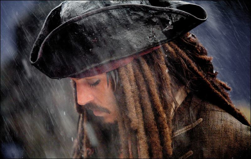 foto: Stephen Vaughan. ALL RIGHTS RESERVED | Johnny Depp moment in the rain