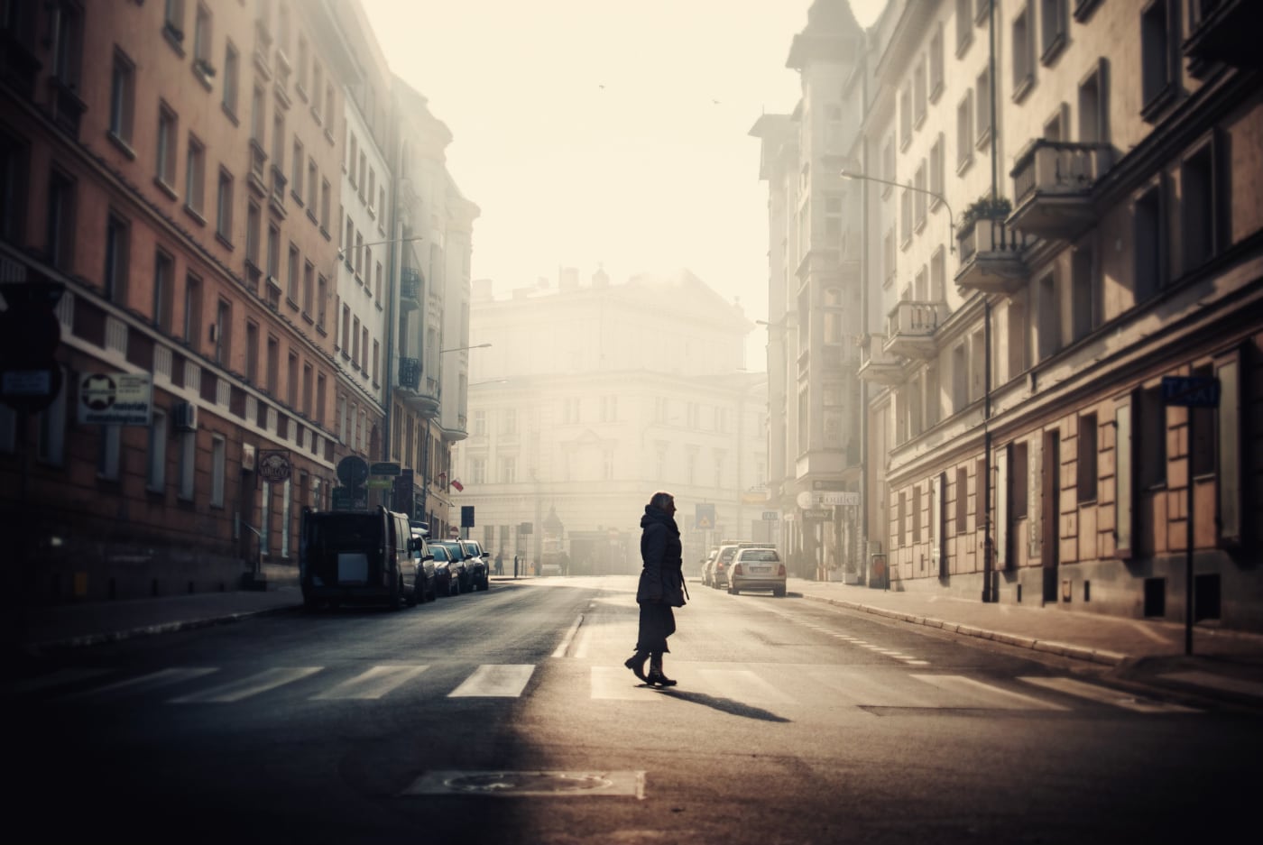 person-middle-streets-poznan-surrounded-by-old-buildings-captured-poland