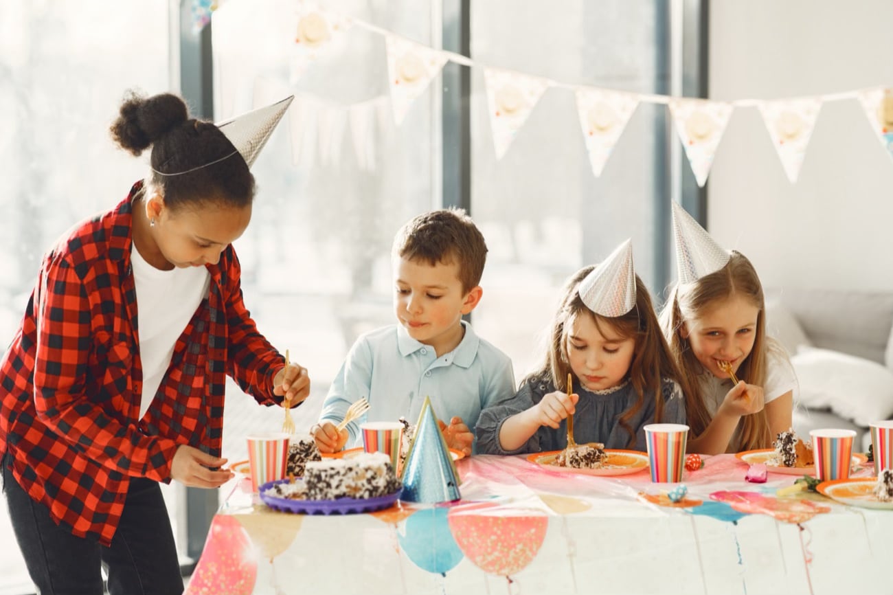 children-s-funny-birthday-party-decorated-room-happy-kids-with-cake-ballons