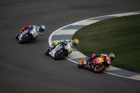 3 Superbikes racing at a grand prix