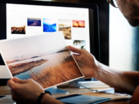 designer looking at photo