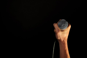 person holding a microphone