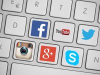 social media logos on computer keys