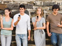 millennials on their cell phones