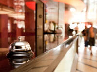 Service bell on front desk at hotel