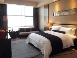 Interior of a luxurious and spacious hotel guest room