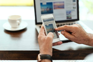 middle aged hands using a smartphone