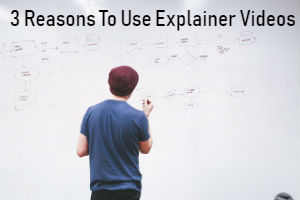man writing formulas on whiteboard