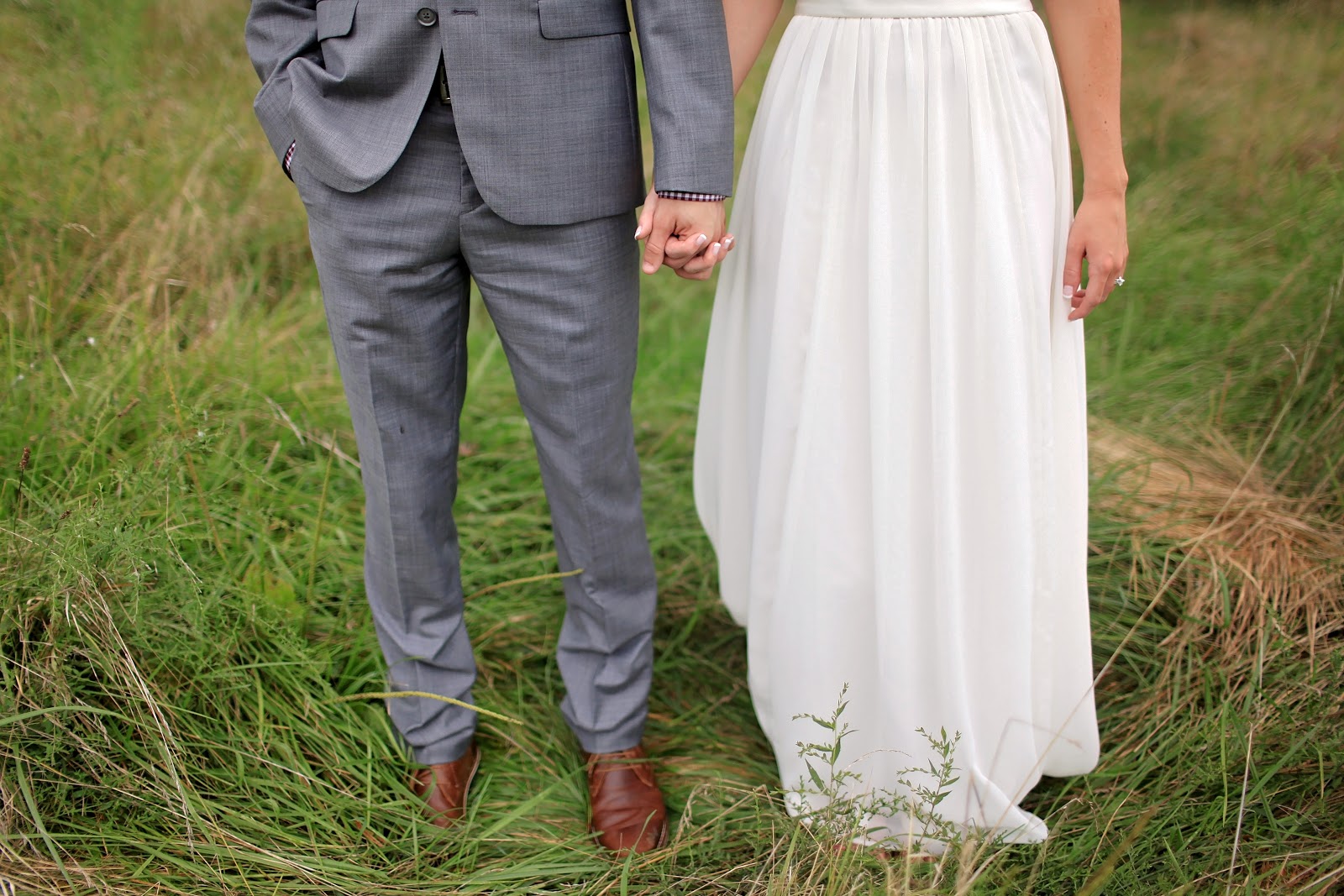 wedding couple holding hands