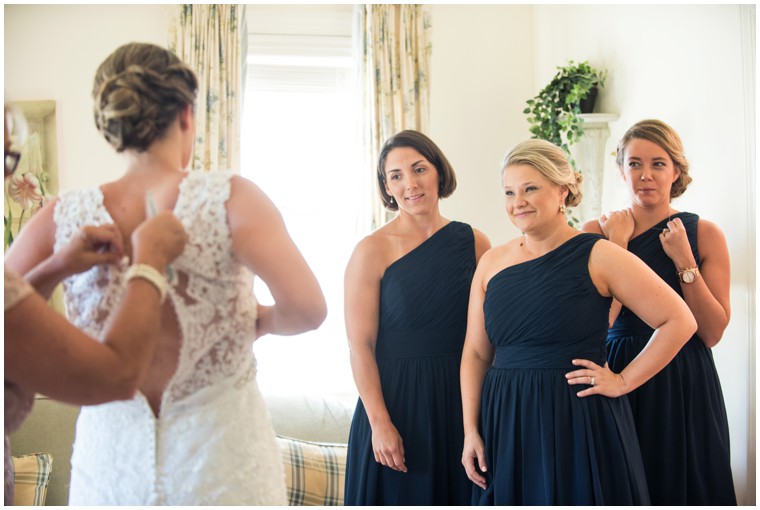 bride getting ready with bridesmaids