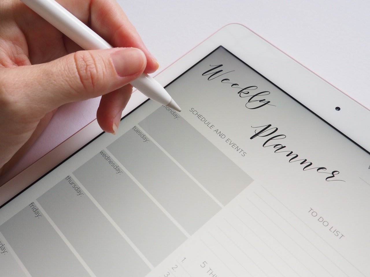 filling out a wedding planner schedule
