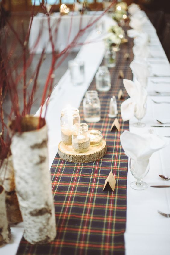plaid table runners at wedding reception