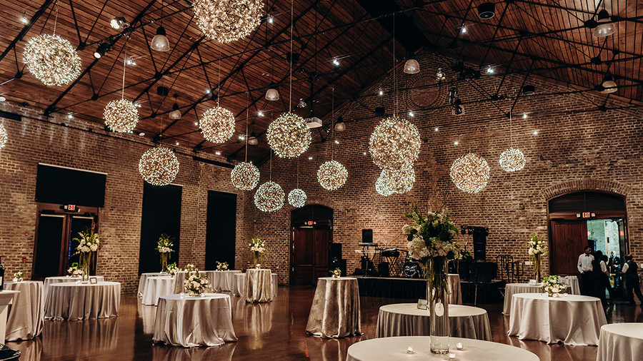 wedding reception with lighted ceiling snowballs