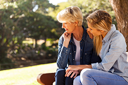Mother and daughter discussing hearing loss