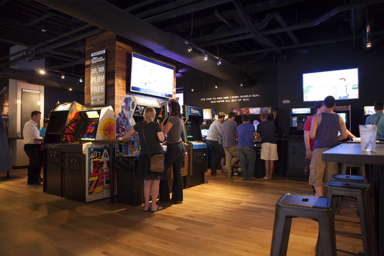 people playing arcade games at16-Bit Bar+Arcade