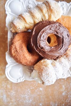 overhead view of chocolate glazed donut and other pastries