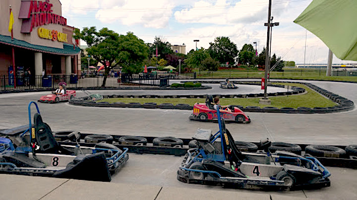 go-carts and track outside of Magic Mountain Building