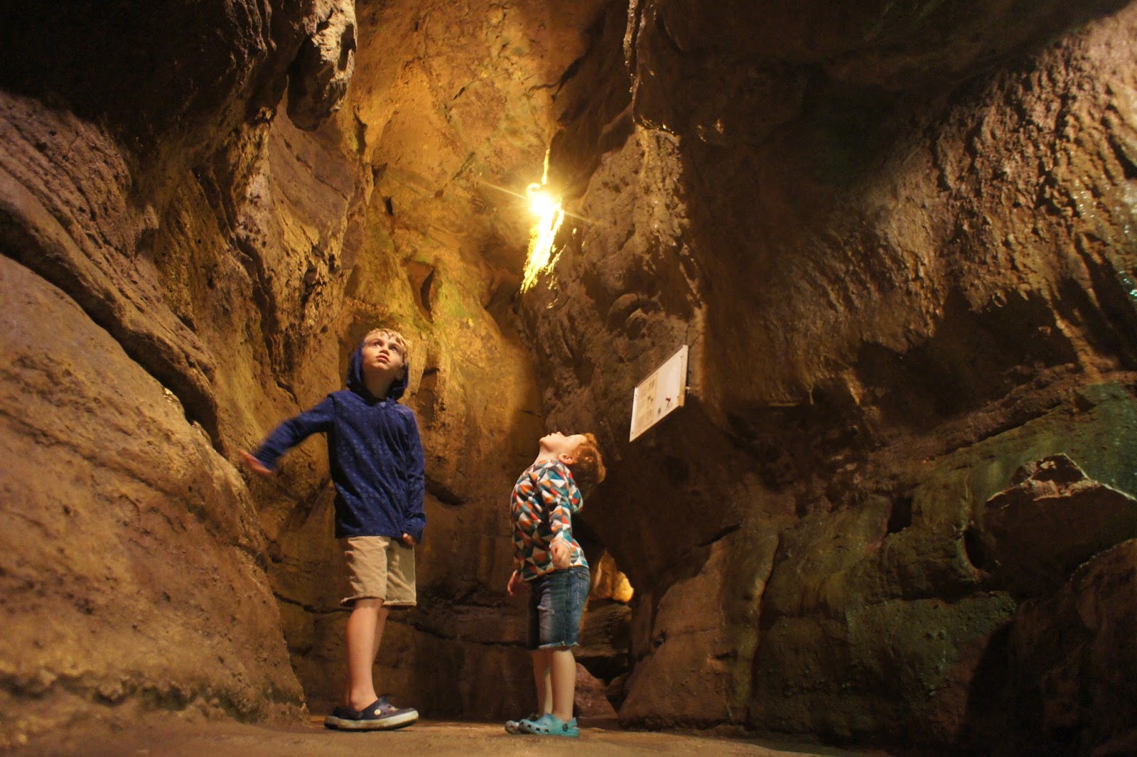 two young boys in a cavern