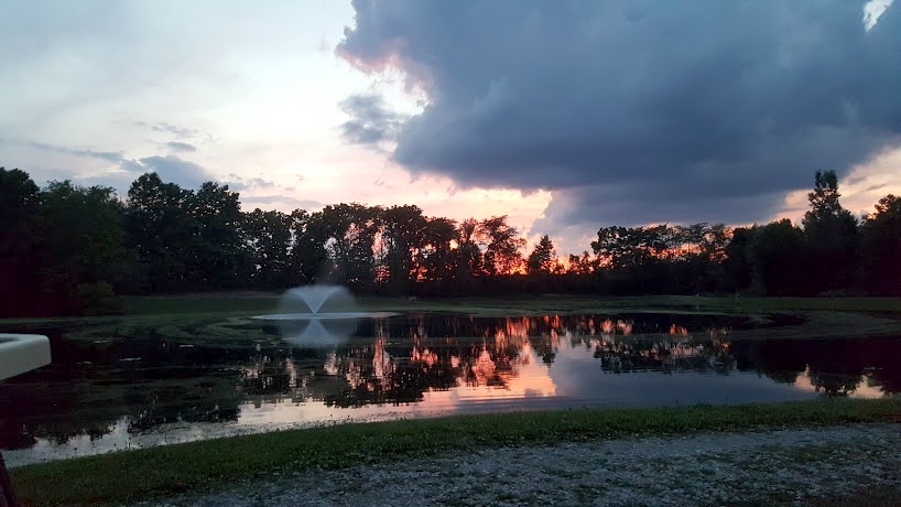 Sunset over Berkshire Lake with fountain