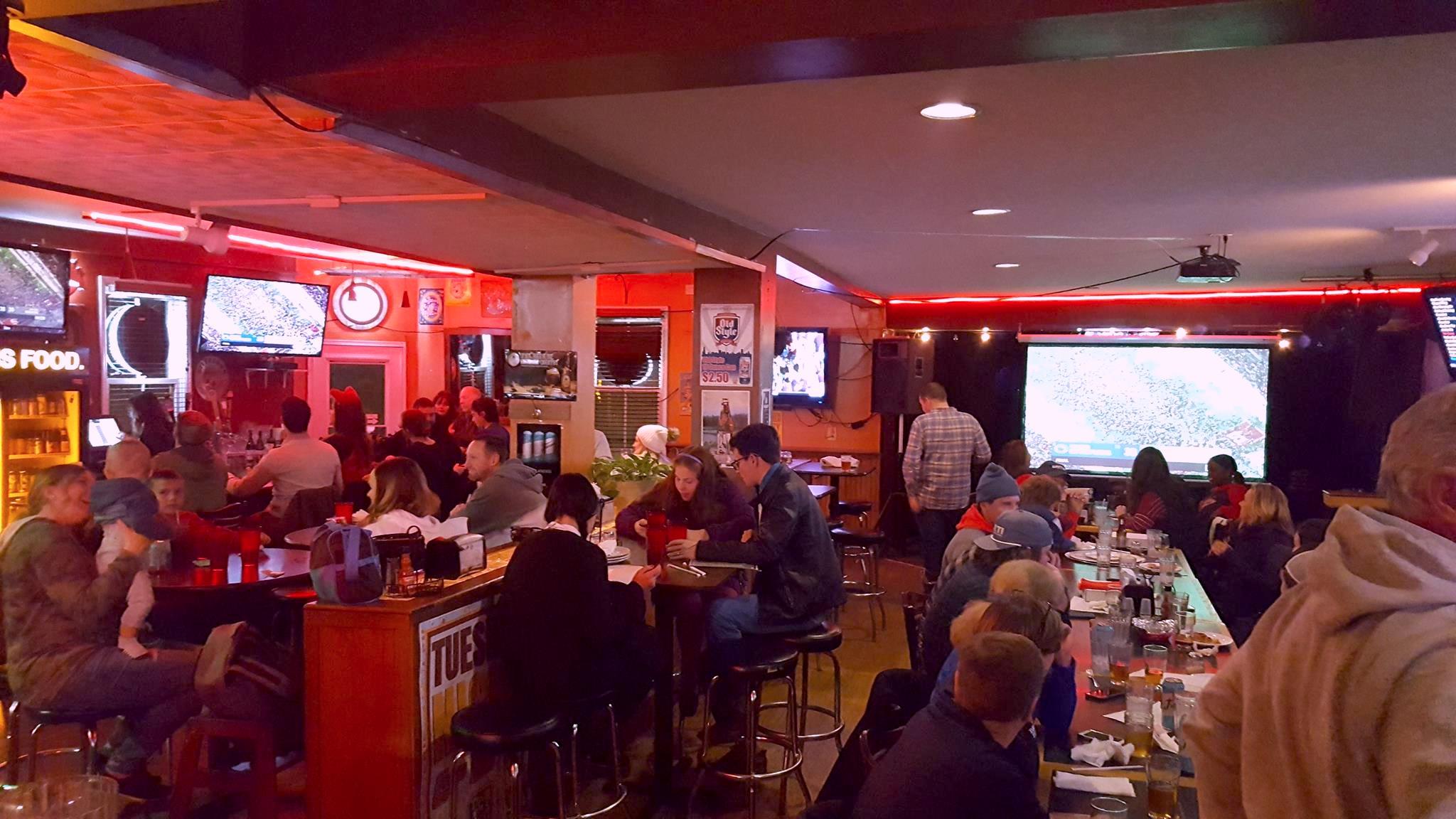people drinking & dining inside South Park Tavern
