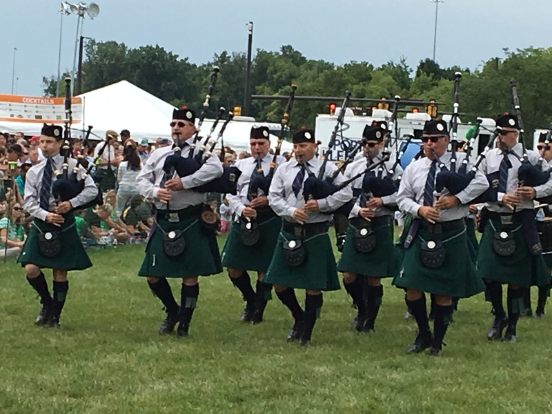 a group of men in kilts play bagpipes at the dublin, ohio irish festival