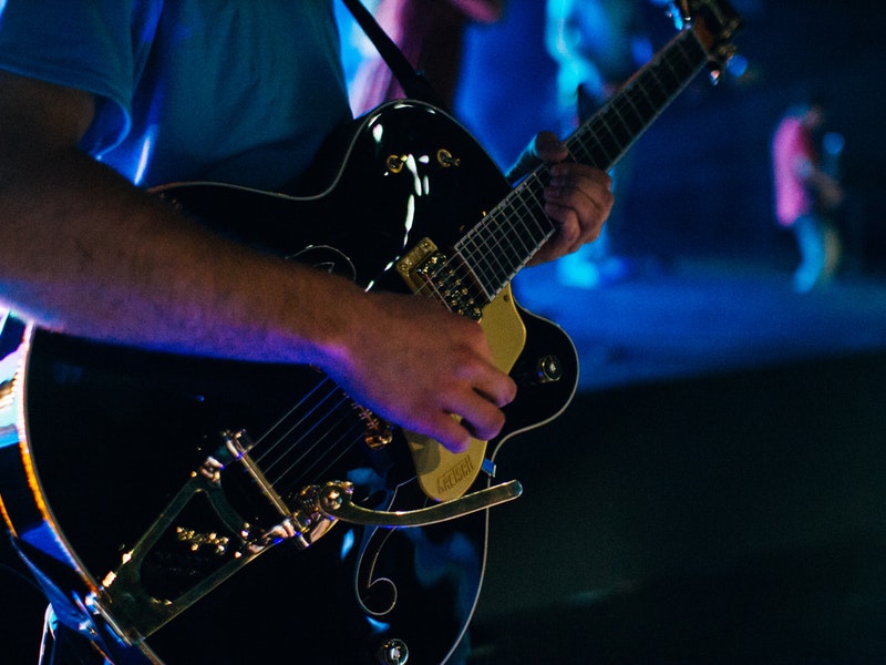 man playing guitar