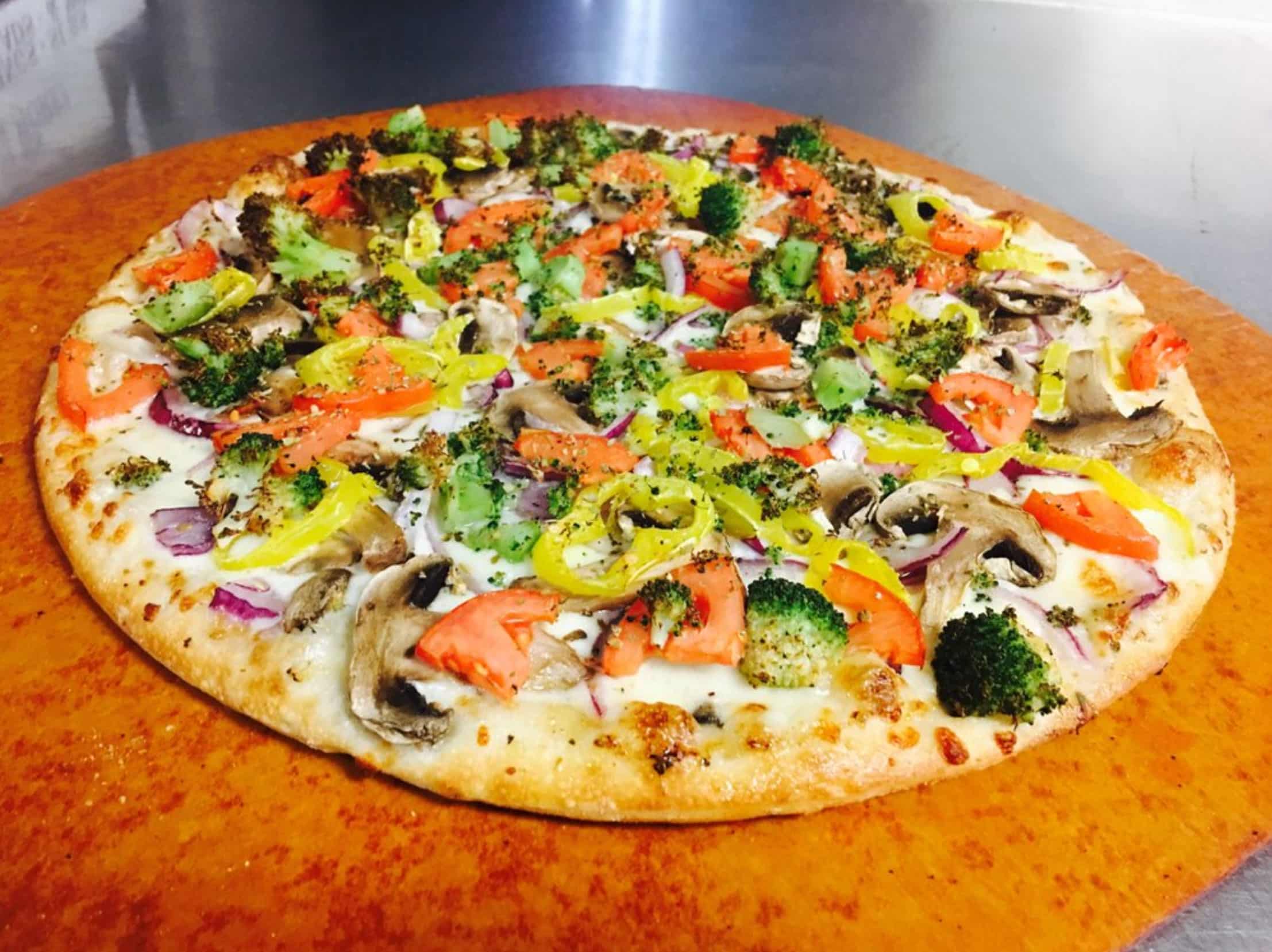 Banana peppers mushrooms tomatoes onions broccoli cheese pizza vegetables