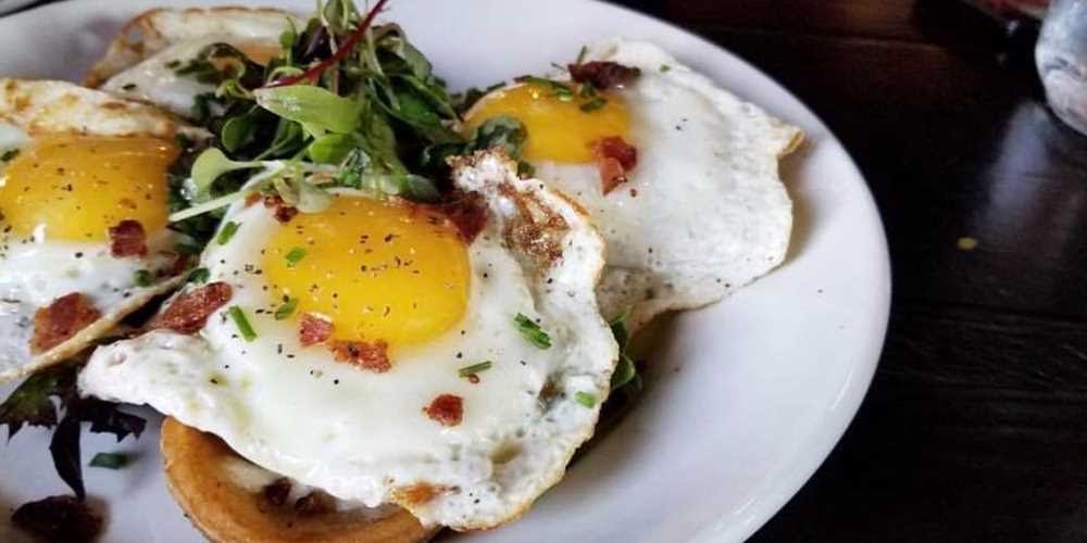 Sunnyside up eggs with greens rom Drunch Eatery in Italian Village.