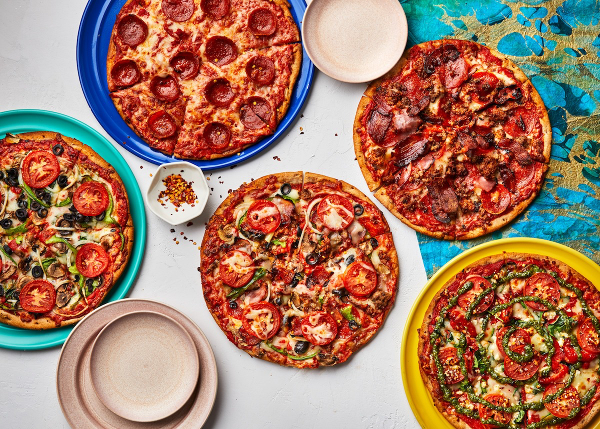 Photo of five pizzas from Mellow Mushroom
