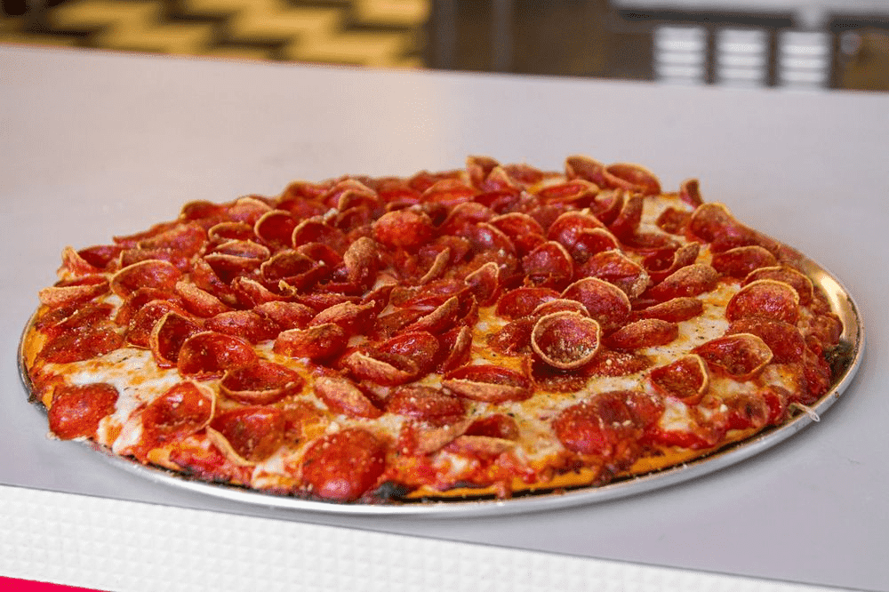 pizza with a lot of pepperoni