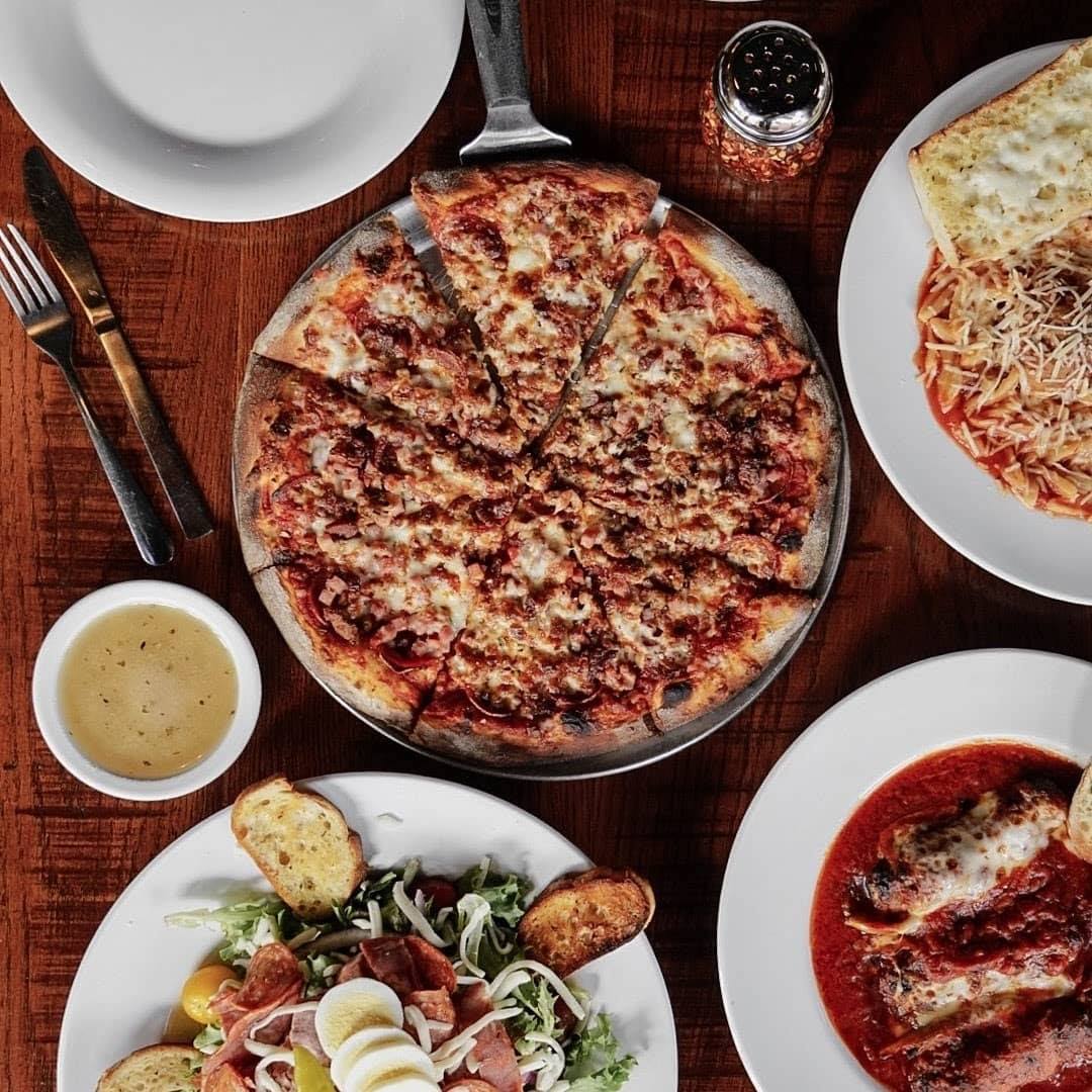 pizza, salad, dressing, and a few other Italian entrees