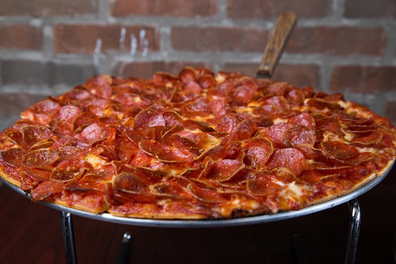 Thin crust pizza with pepperoni from Grandad's Pizza