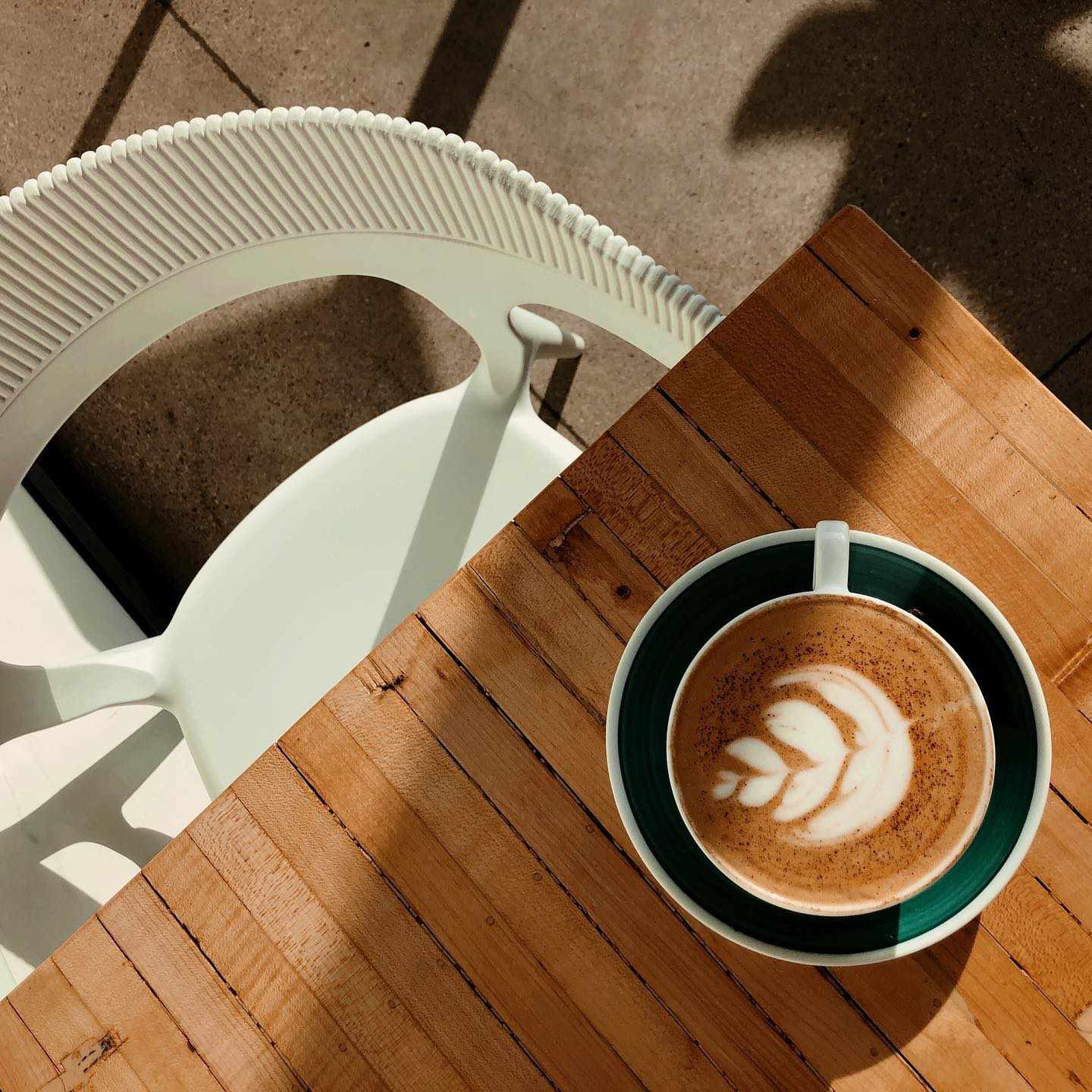 Coffee with a cream leaf